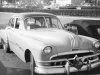 0403pon_02z+1951_Pontiac_8+Four_Door_Passenger_Side_Front_View.jpg