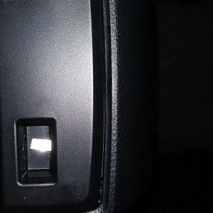 Normal Closed (NC) switch from amazon attached to the existing hole of the center console.