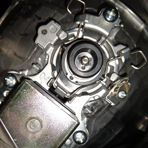 Image of Passenger HID Assembly with moisture cover & power connector off