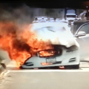 Dicks burning car.jpg